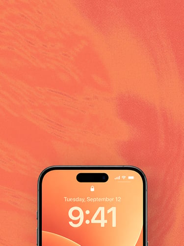 Close-up van een smartphonevergrendelscherm met oranje abstracte achtergrond, datum Tuesday September 12 en tijd 9:41